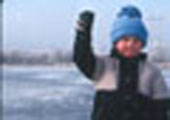 Boy Ice Fishing, with Catch